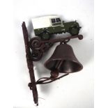 A wall mountable, cast iron bell with Land Rover surmount, approximately 34 cm (h),