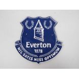 A cast iron wall plaque marked Everton, 24 cm x 23 cm,