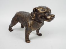 A bronzed, cast iron model of a pitbull, approximately 18 cm (h),