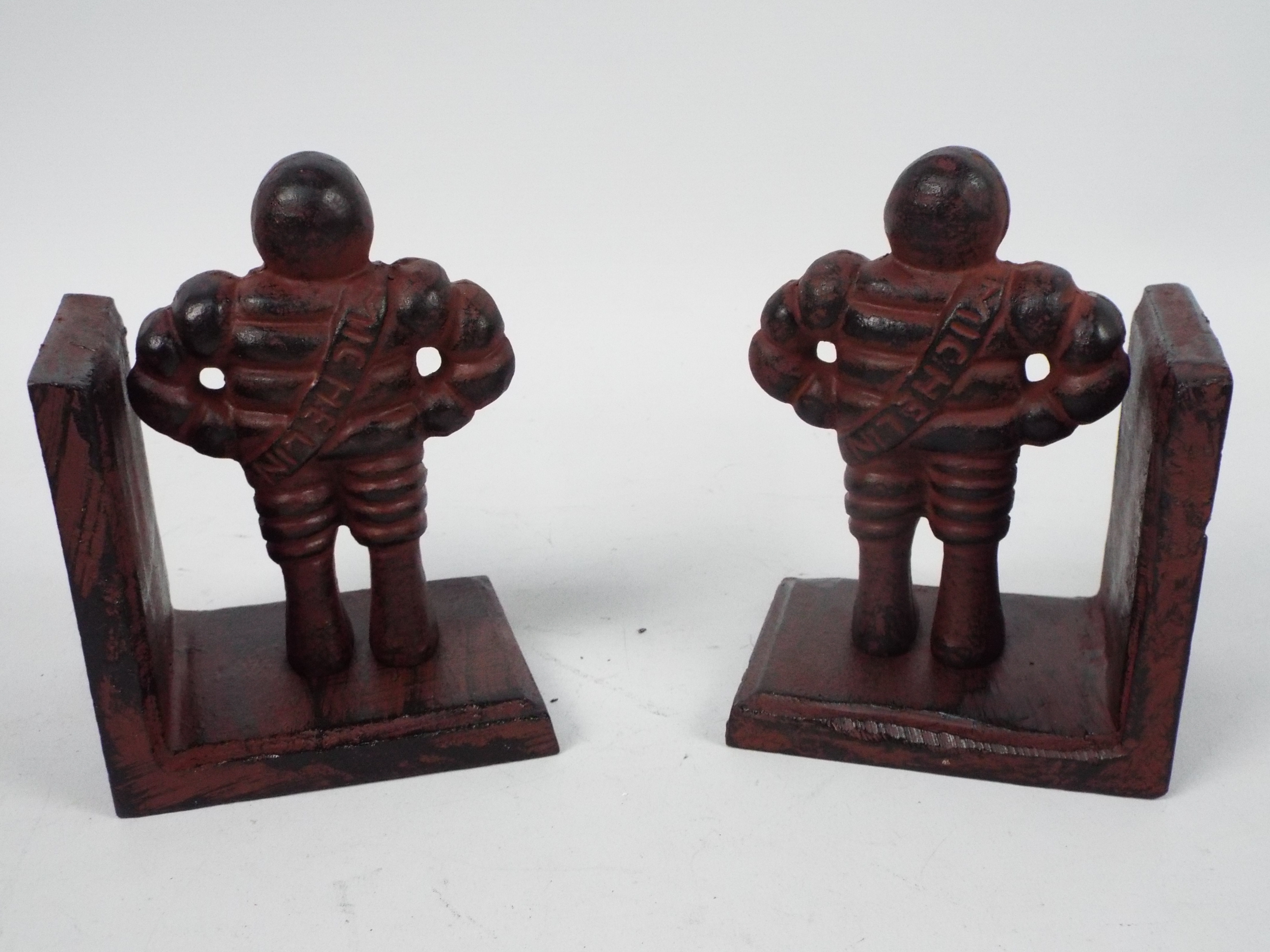 A pair of cast iron Bibendum (Michelin M - Image 2 of 2