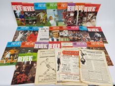 A quantity of football programmes, predo