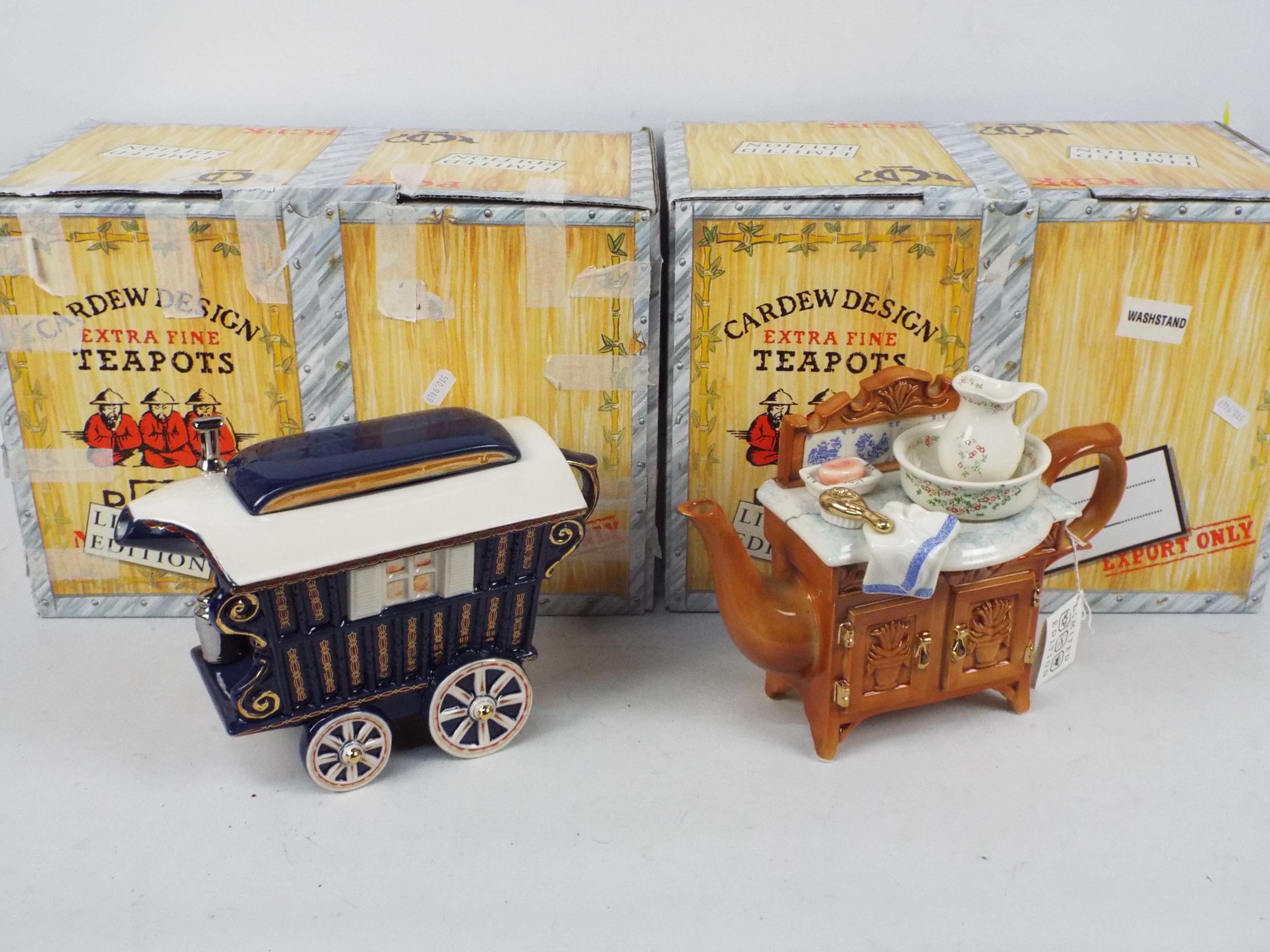 Two boxed, limited edition, novelty teapots.