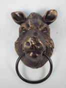 A bronzed, cast iron, wall mountable boa