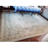 A large cream rug measuring 360 cm x 270 cm.