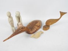 Lot to include carved wooden animals,