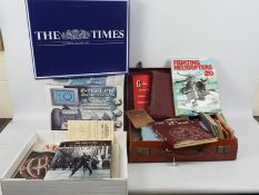 A mixed lot to include vintage sheet music, military related publications, various ephemera,