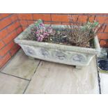 A reconstituted stone rectangular planter,