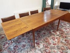 Uldum möbelfabrik, Denmark - a teak dining table, 72 cm x 138 cm (extending to 245 cm) x 87.
