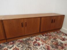 G Plan Furniture - a teak low chest of twin cupboards, 54 cm x 162 cm x 45 cm,