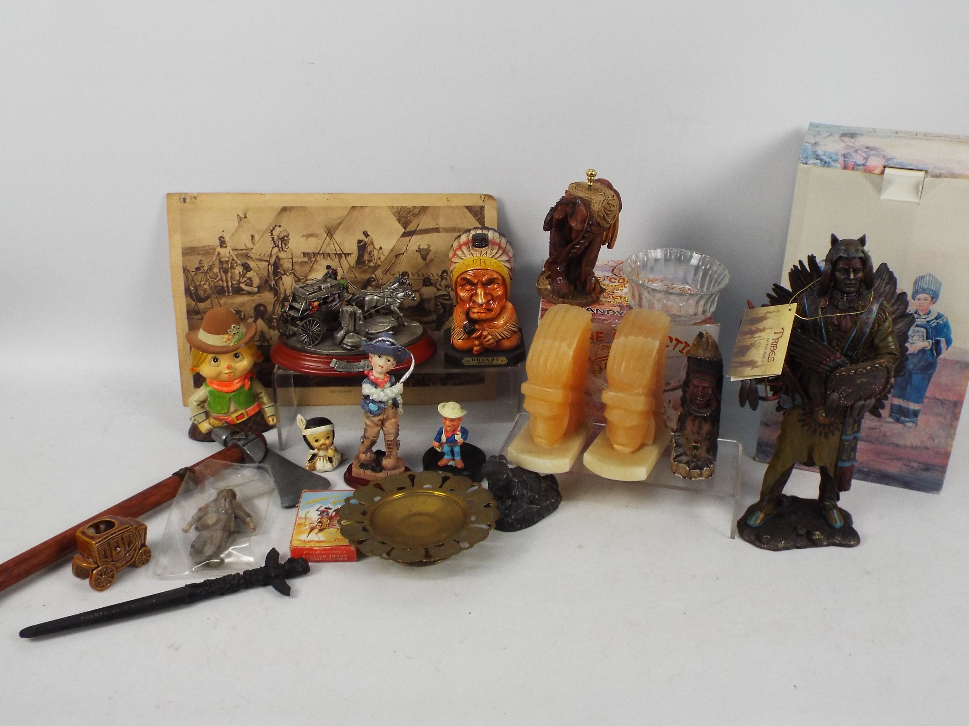 A collection of Native American and cowboy themed items, part boxed.