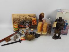 A collection of Native American and cowboy themed items, part boxed.