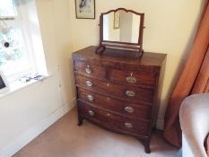 A chest of two over three drawers with v