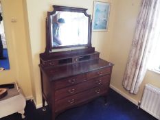 A vanity chest of two over two drawers w