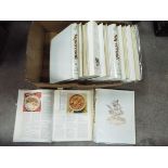 A collection of recipe books and an AA m