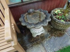 A reconstituted stone bird bath of shell form, 59 cm NOTE: ITEM IS LOCATED IN ST HELENS,