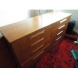 G Plan Furniture - a teak chest of 8 drawers, 76 cm x 142 cm x 44 cm,