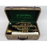 A vintage brass cornet contained in fitted case.