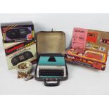 Lot to include a vintage car security system (boxed), boxed radio and bass speaker,