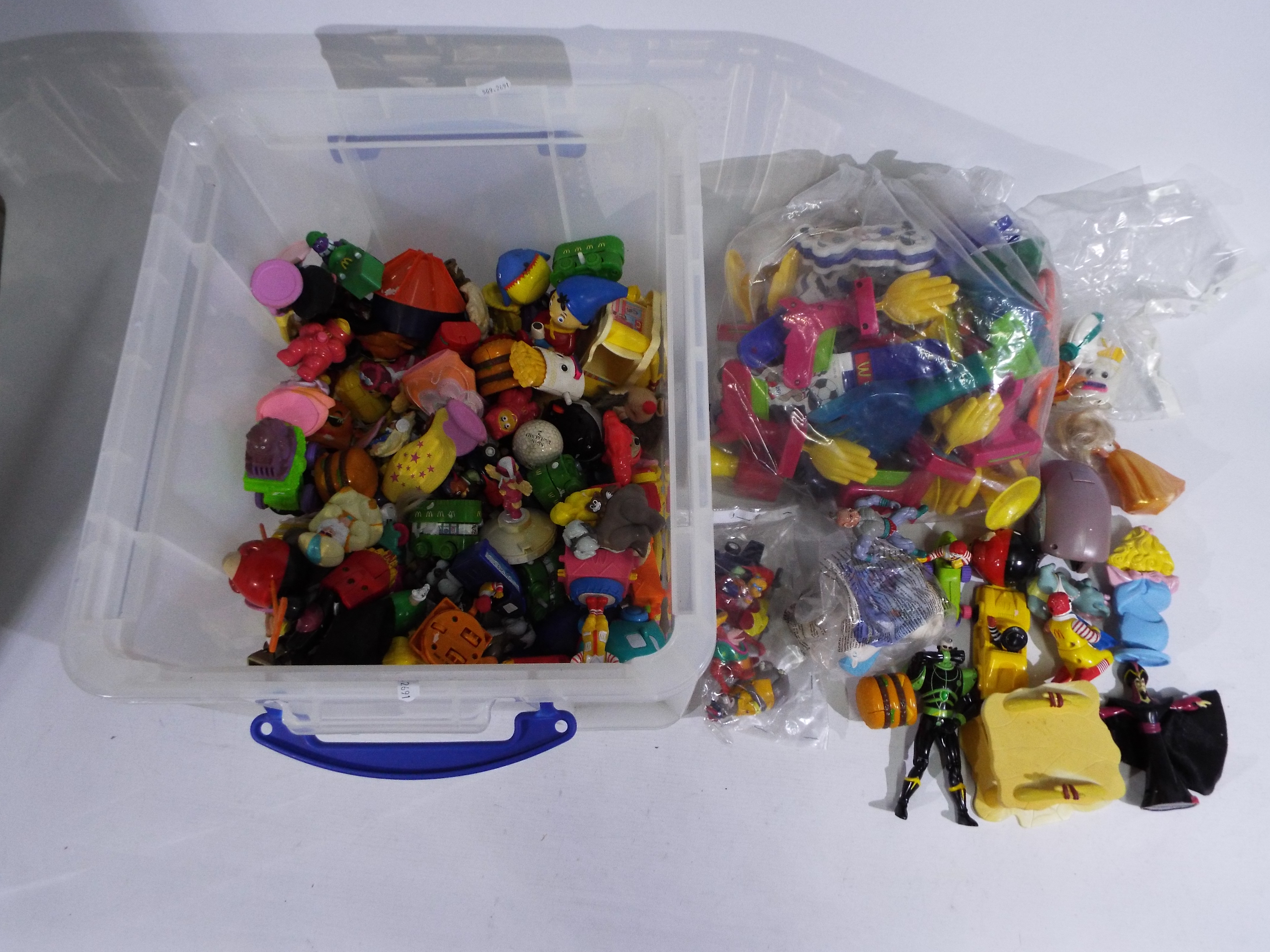 Toy Figures - McDonalds Toys - a large collection of plastic characters and similar ( in access of