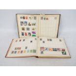 Philately - Two stamp albums containing a quantity of UK and foreign stamps.