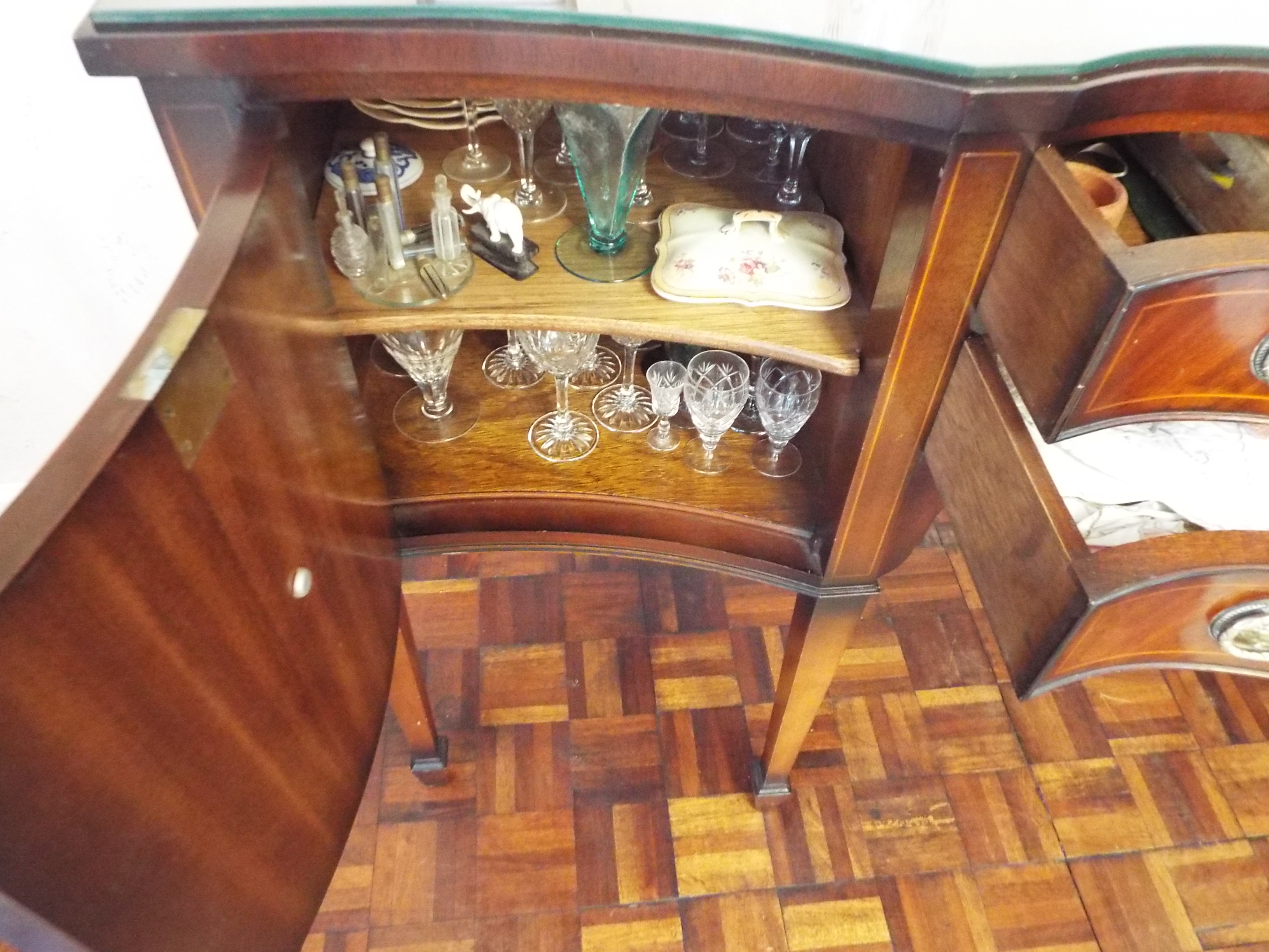 A sideboard having twin drawers flanked by single door cupboards with protective glass top, - Image 4 of 5