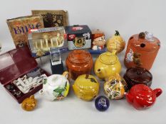 Lot to include promotional ceramics, teapots, paperweights and other.