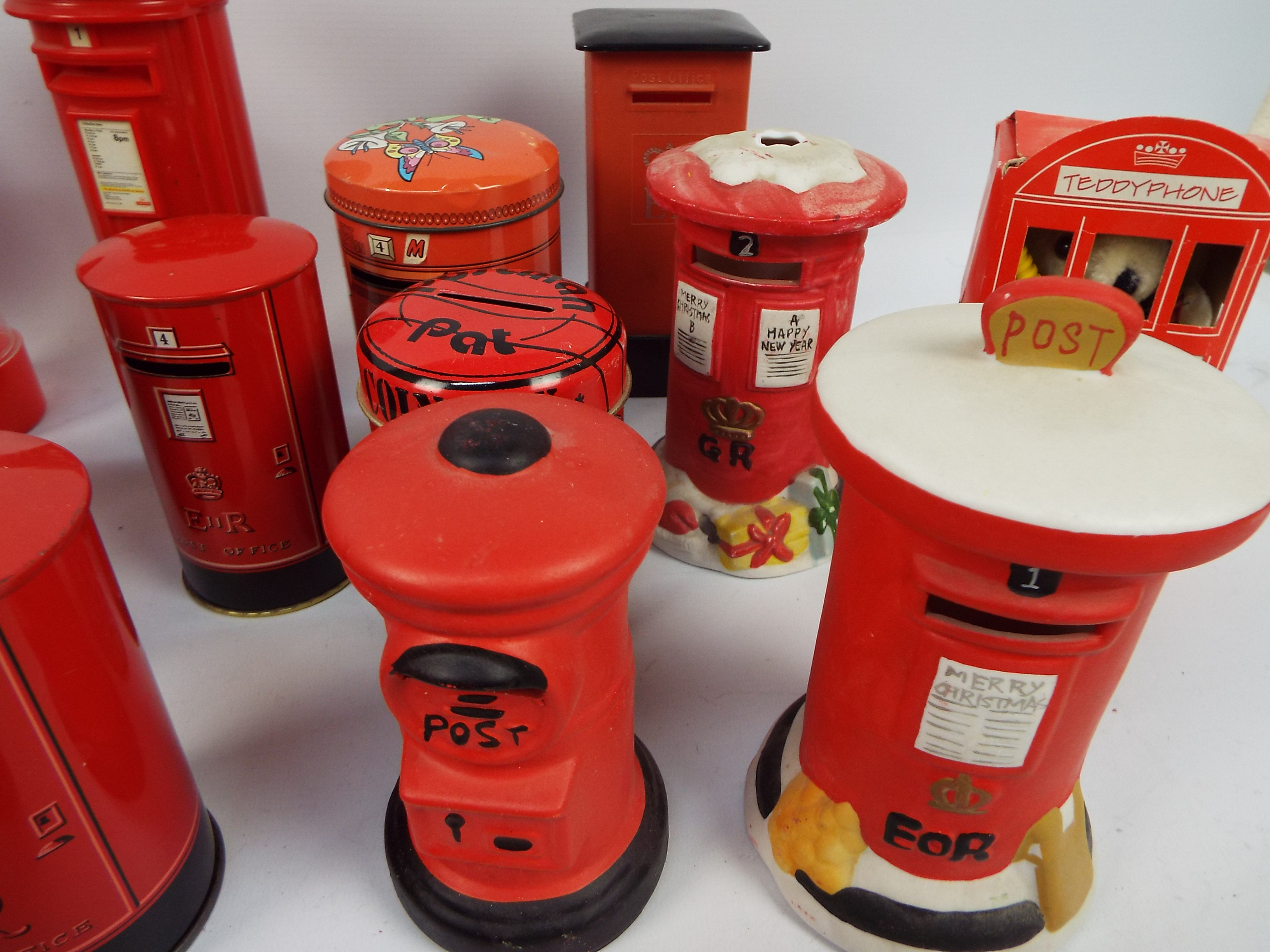 A collection of Post Office pillar box models and money banks to include ceramic and tin examples. - Image 3 of 4