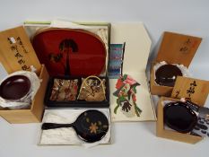 A collection of boxed items to include table wares and similar.