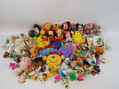 A quantity of soft toys, McDonalds toys and other.