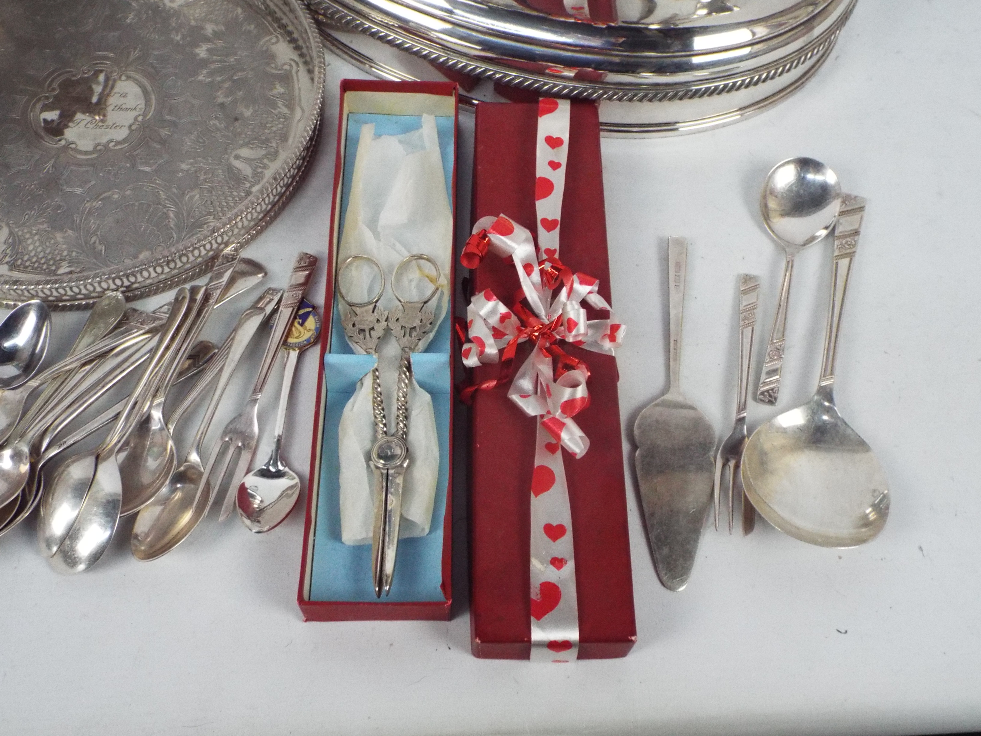 A collection of plated wares to include a cloche, tray, flatware and other. - Image 4 of 6