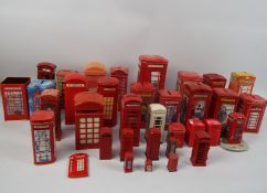 A collection of models, money banks and similar in the form of telephone boxes.