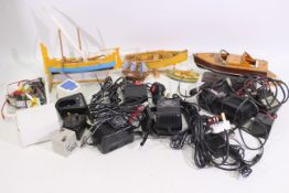Lot to include battery charger, controller, power unit, model boats and similar.