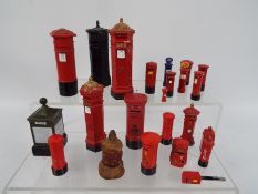 A group of miniature and small scale Post office pillar box models, smallest approximately 2 cm (h).