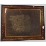 An oak framed John Speed map of Wales, approximately 38 cm x 49 cm image size.