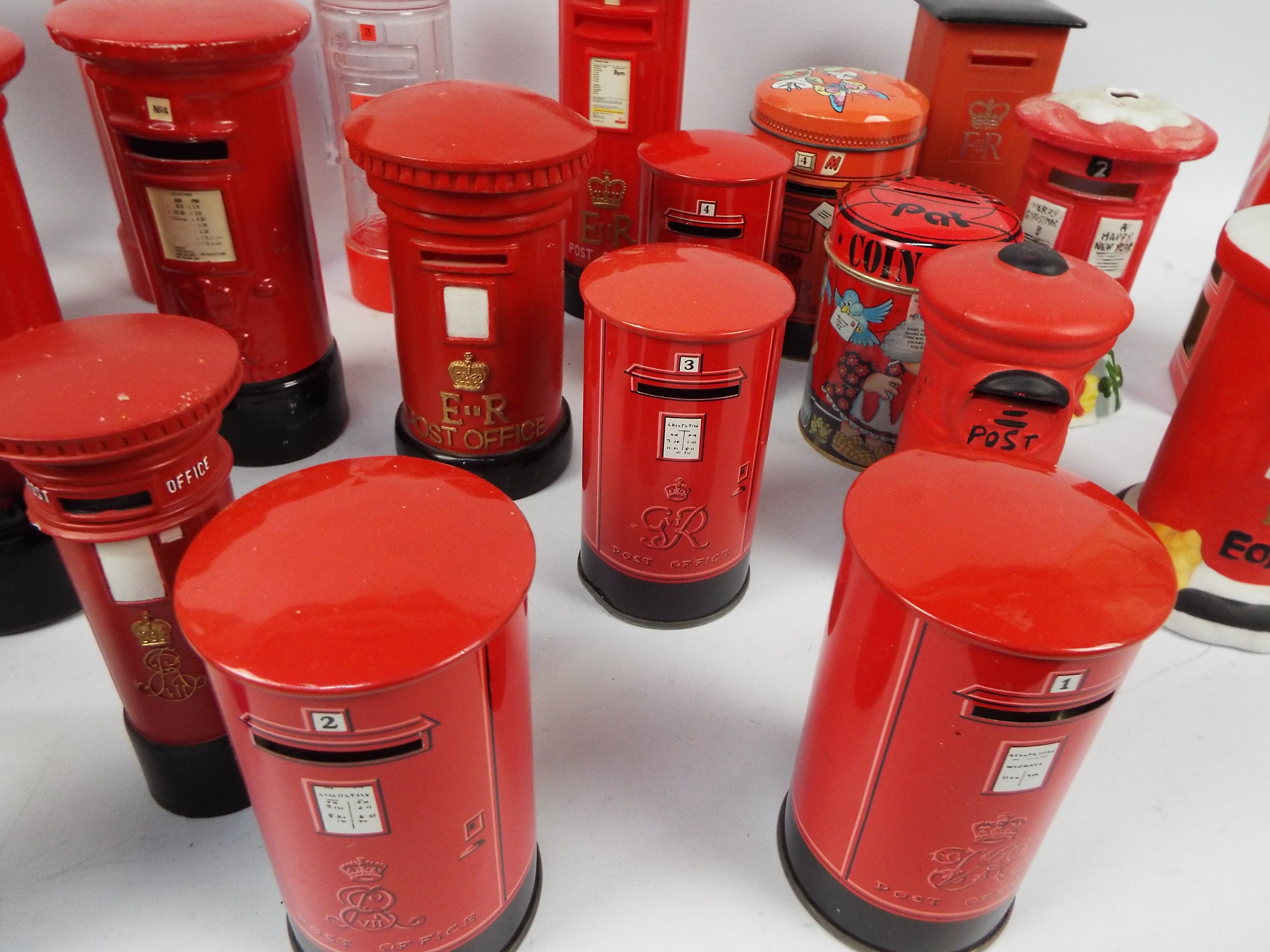 A collection of Post Office pillar box models and money banks to include ceramic and tin examples. - Image 2 of 4