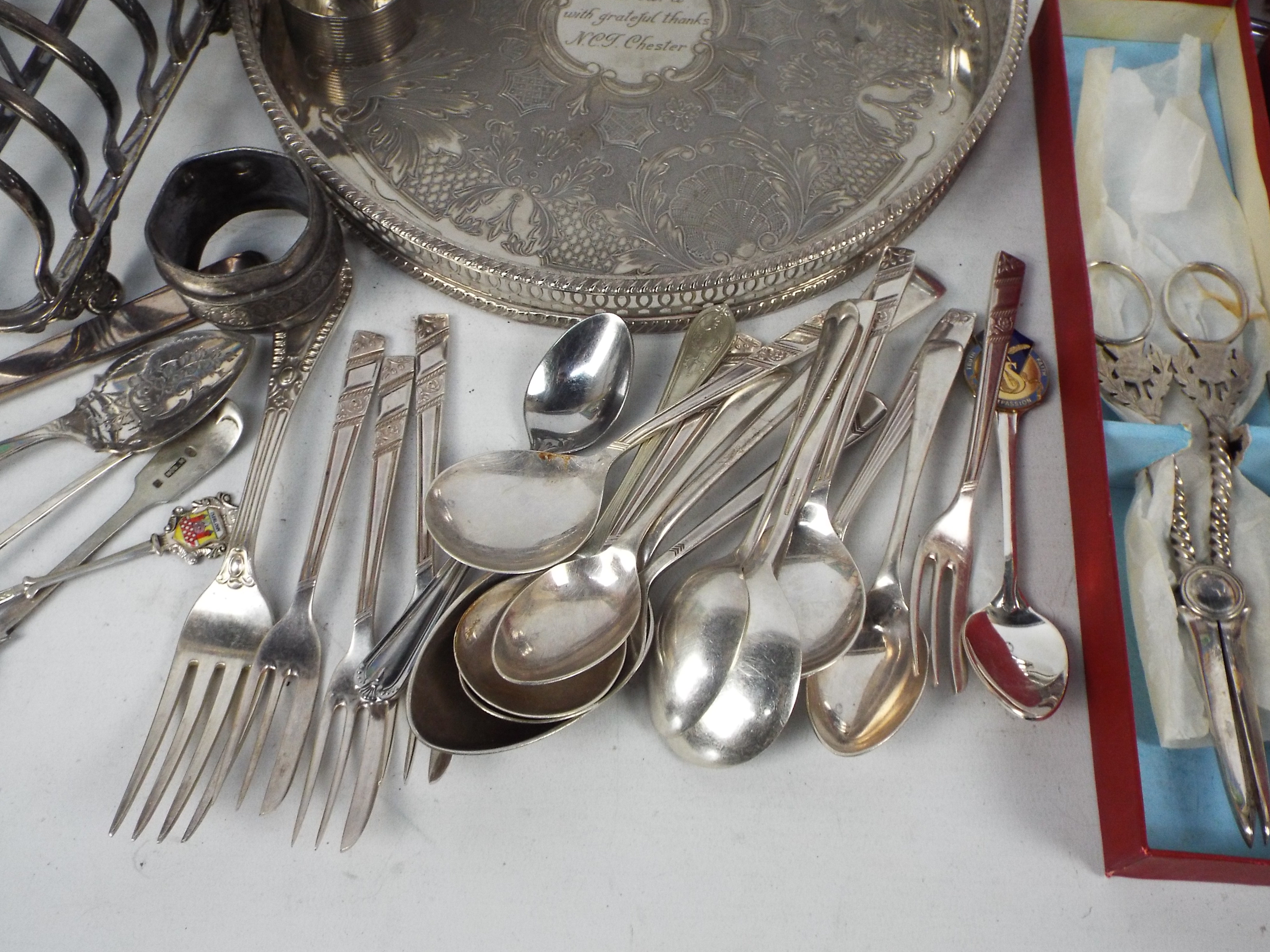 A collection of plated wares to include a cloche, tray, flatware and other. - Image 3 of 6