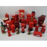 A collection of various Post Office pillar box models, money banks and similar.