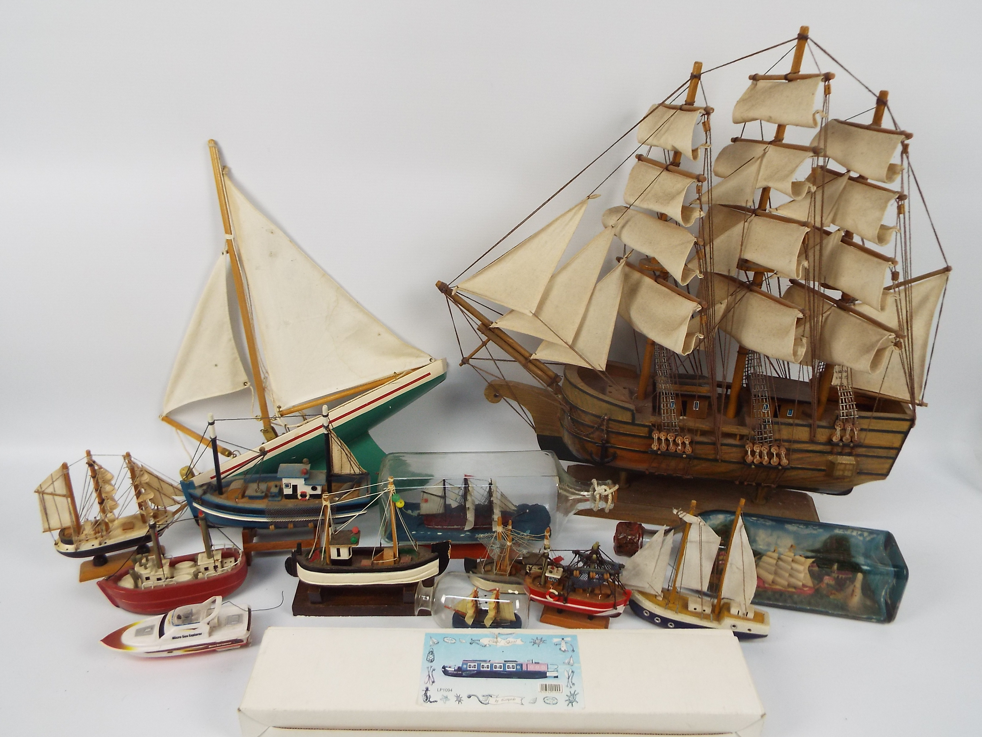 A collection of model ships, ships in bottles and similar,