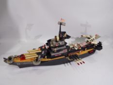 Topper Toys - An unboxed battery operated 'USS Battlewagon' from Topper Toys.