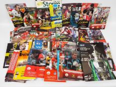 A quantity of rugby league programmes, p