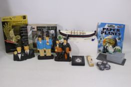 Lot to include Laurel and Hardy figures, boxed Atlas Editions Heritage Collection pocket watch,
