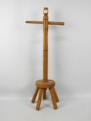 A pine laundry dolly with turned column, approximately 92 cm (h).