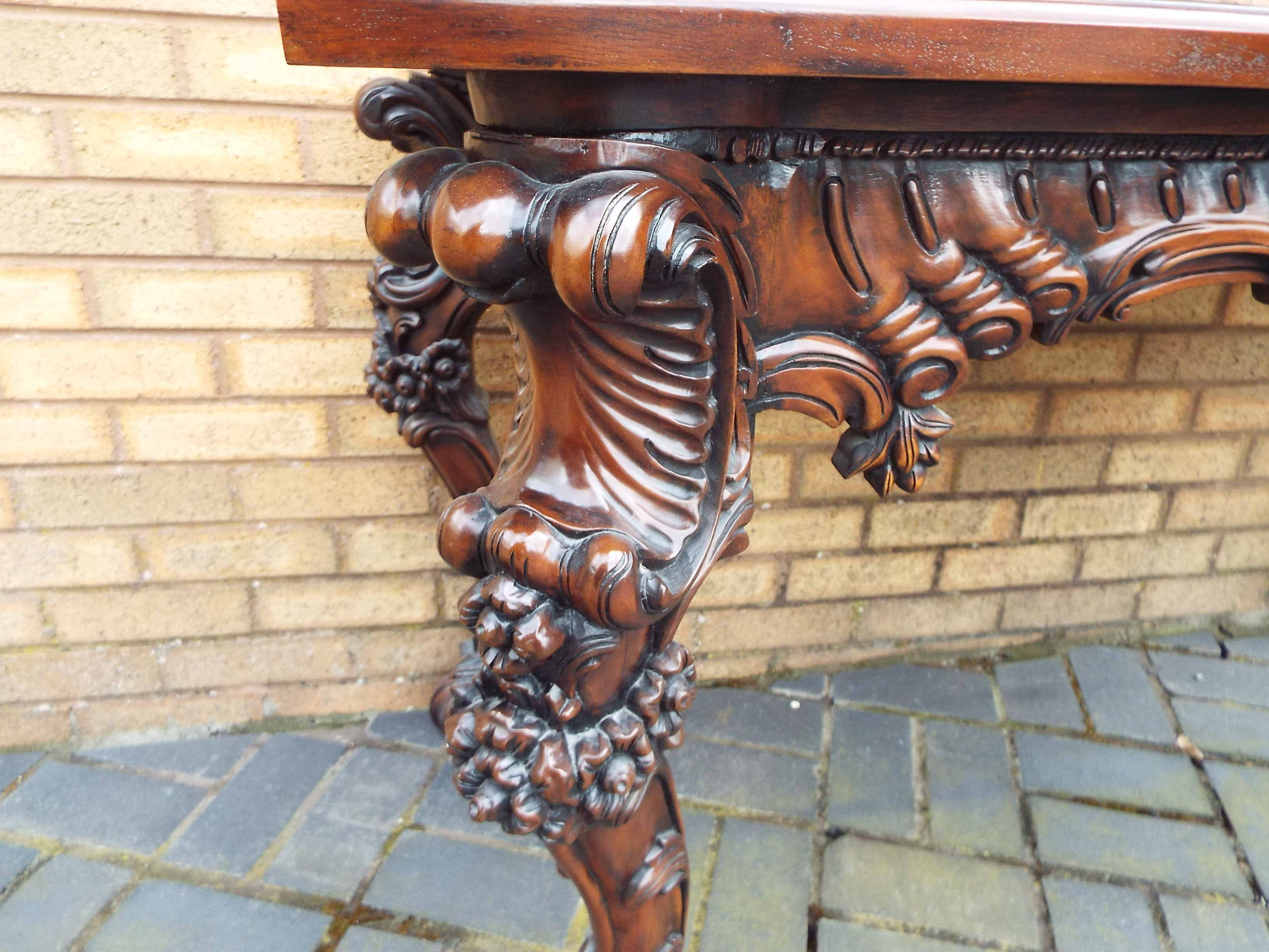 A side table profusely carved with floral and foliate motifs and central female mask, - Image 5 of 11