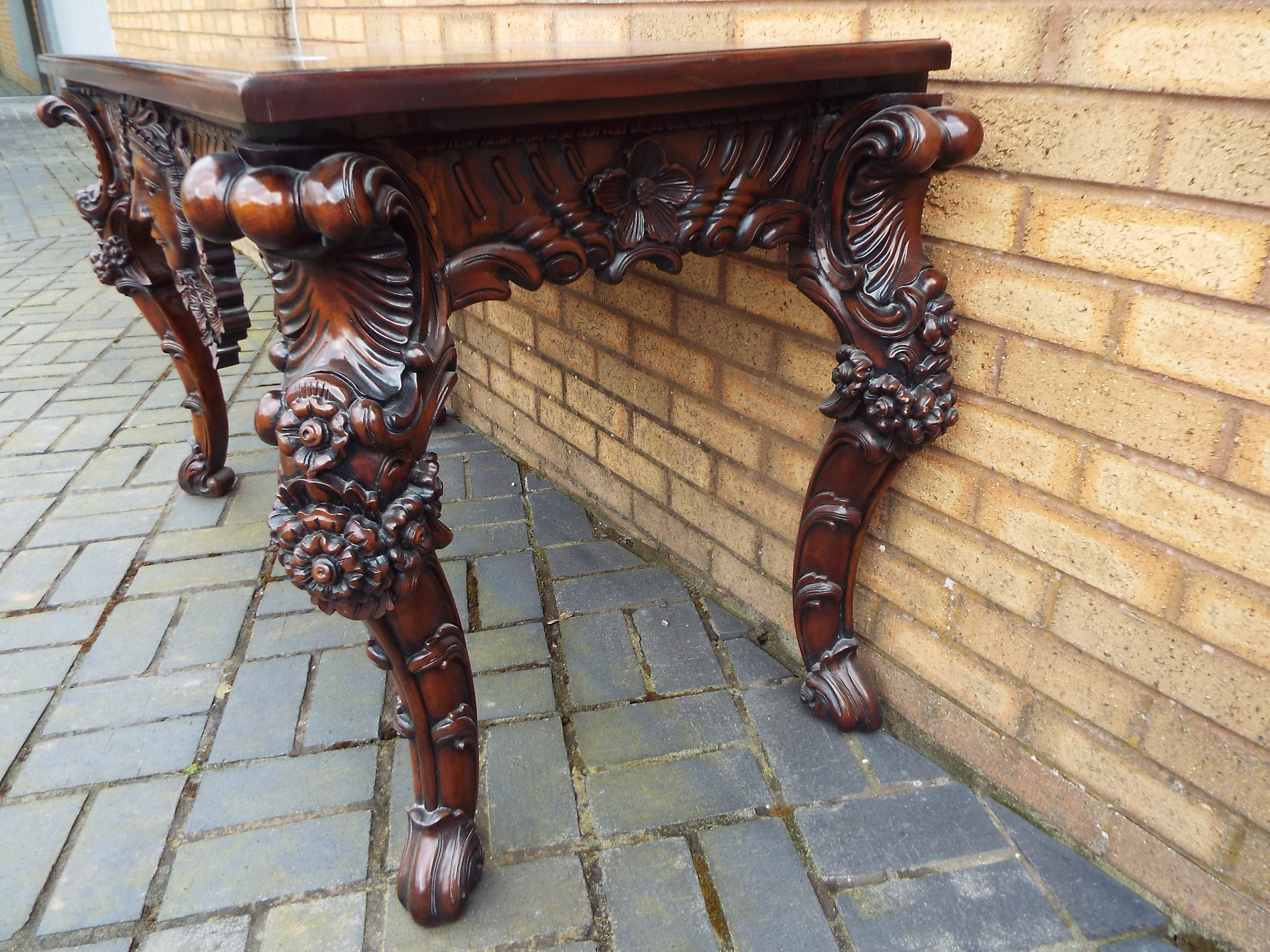 A side table profusely carved with floral and foliate motifs and central female mask, - Image 8 of 11