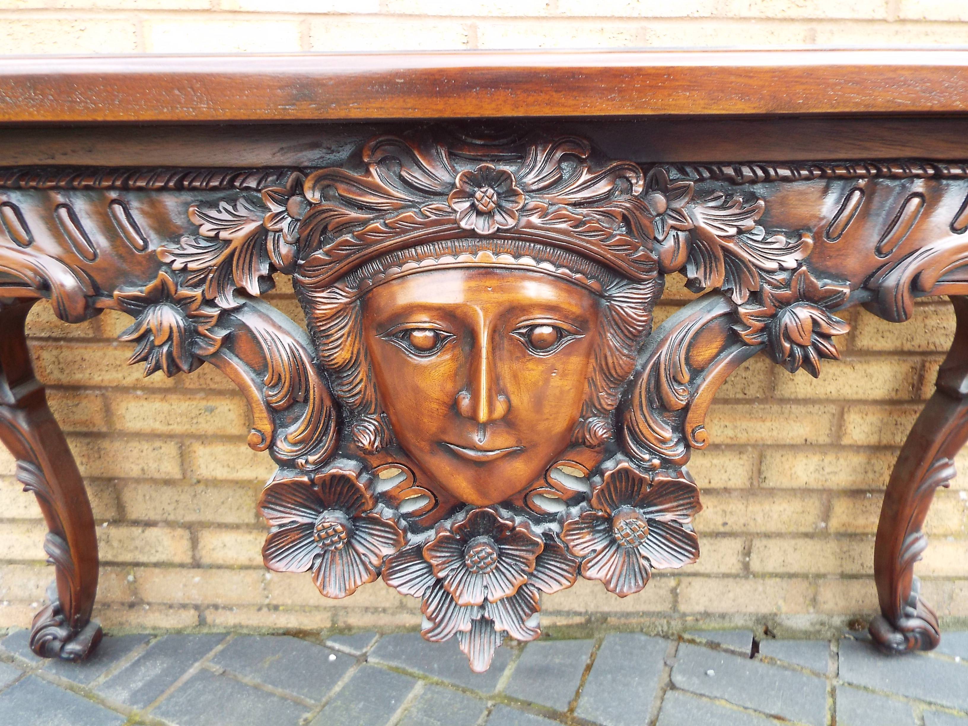 A side table profusely carved with floral and foliate motifs and central female mask, - Image 11 of 11