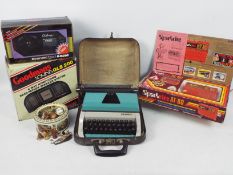 Lot to include a vintage car security system (boxed), boxed radio and bass speaker,