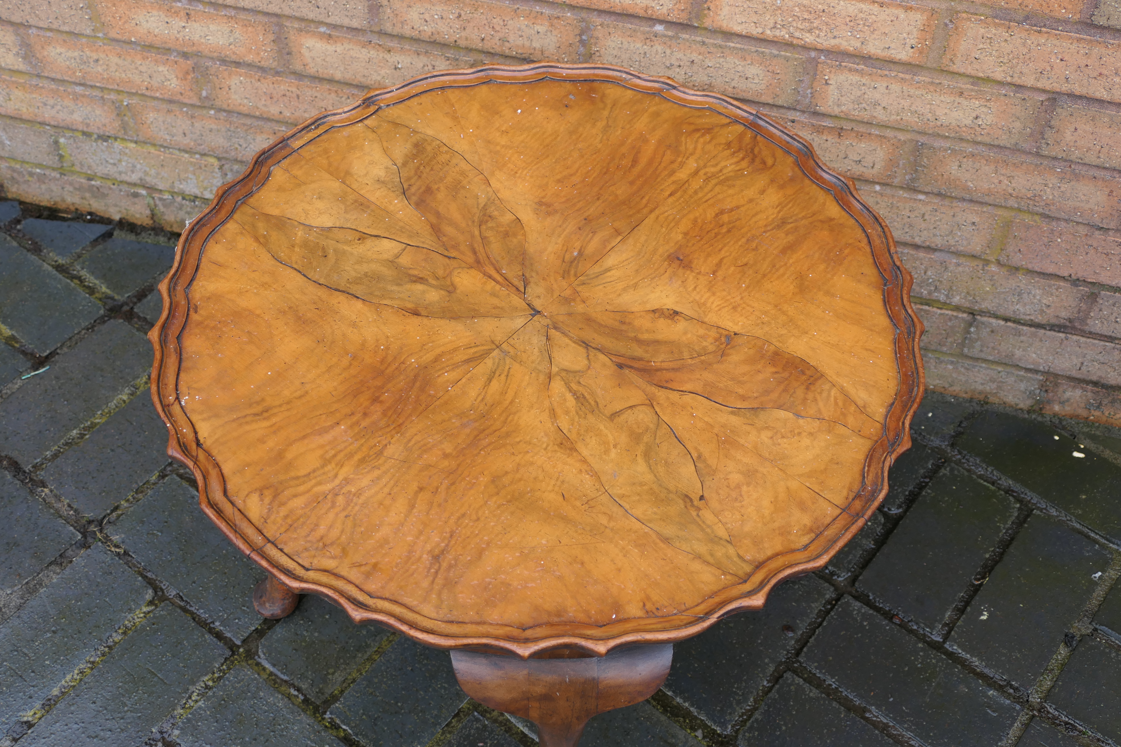 A walnut occasional table with shaped circular top, raised on cabriole supports, - Image 2 of 2