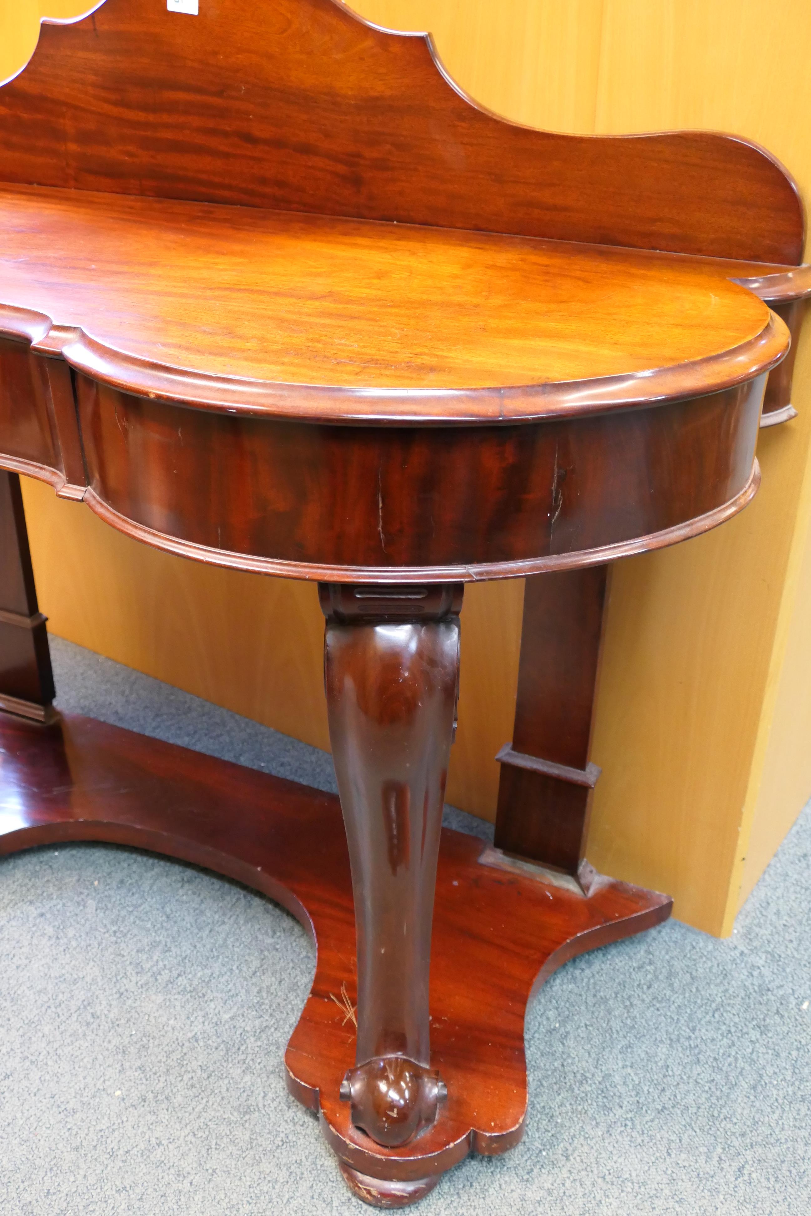 A mahogany, serpentine front, ledgeback console table with narrow central drawer, - Image 3 of 5