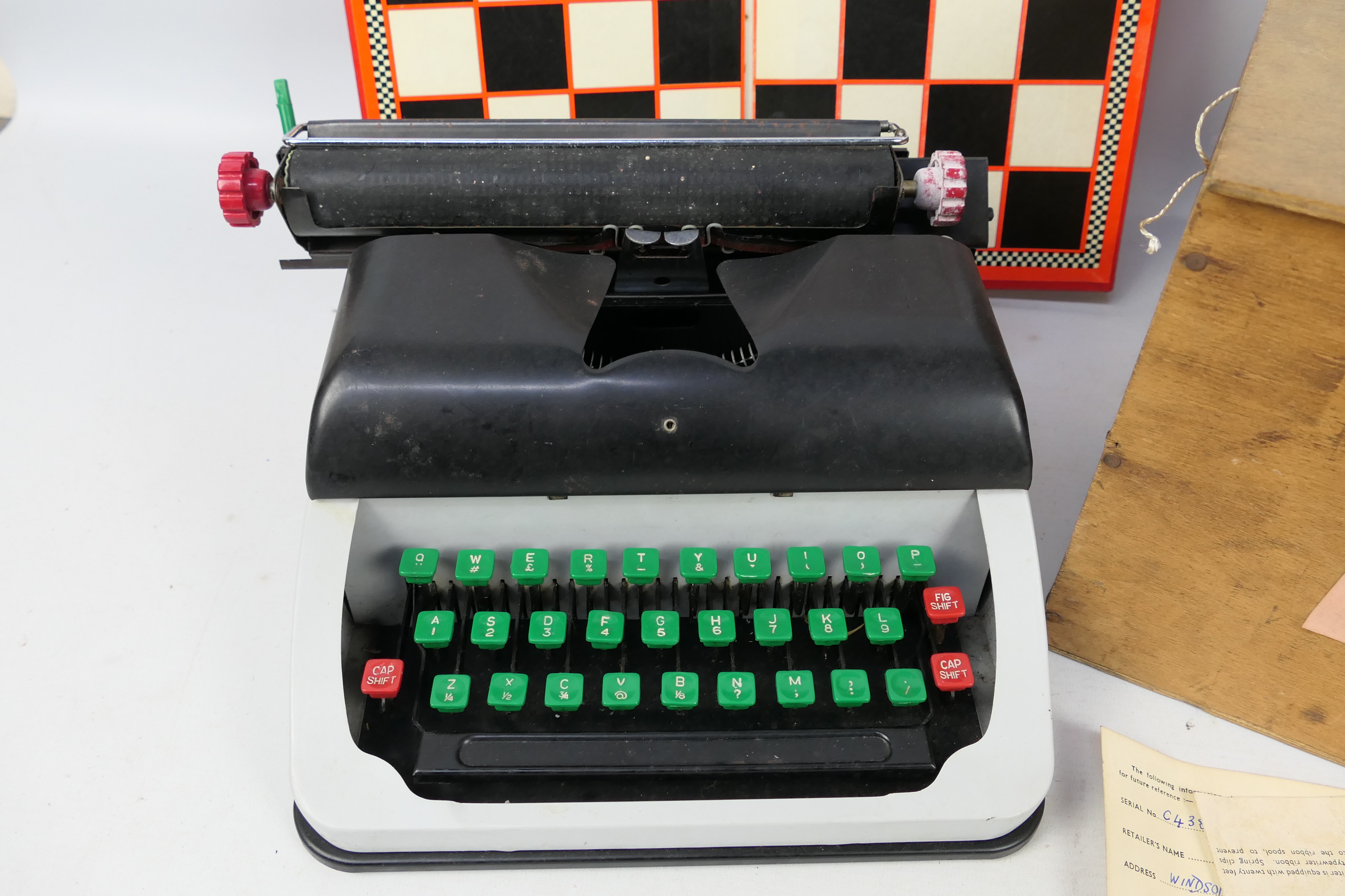 A Lilliput Mark IV typewriter contained in shipping crate and a folding chess board. - Image 2 of 3