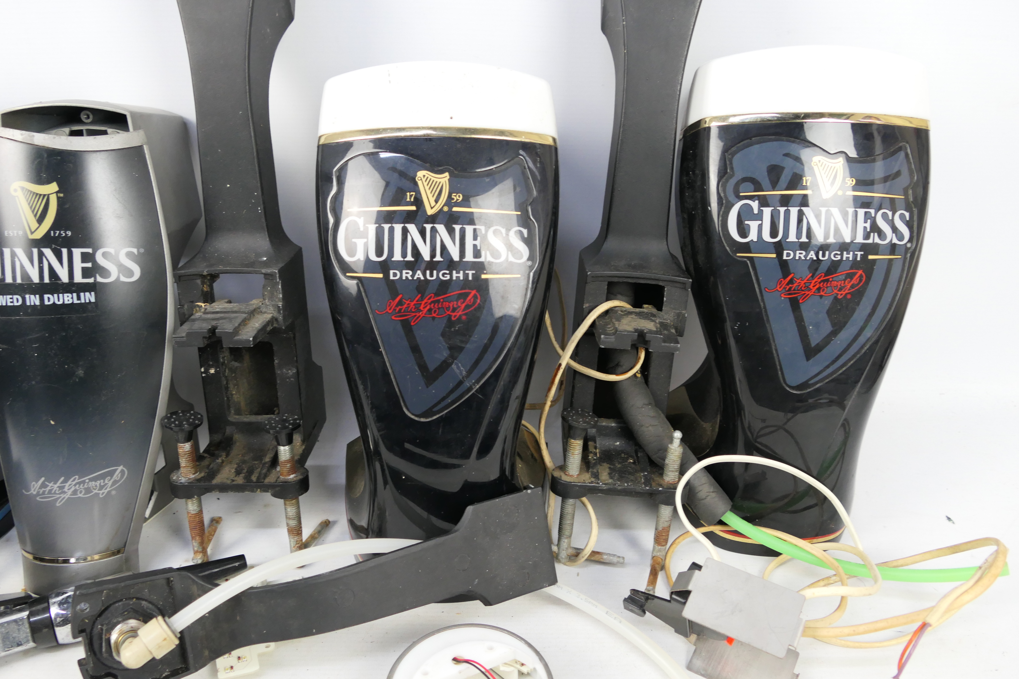 Guinness - Three Guinness bar top pump covers. - Image 4 of 4